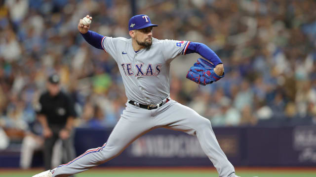 Oct 4, 2023; St. Petersburg, Florida, USA; Texas Rangers starting pitcher Nathan Eovaldi (17) pitches against the Tampa Bay Rays in the first inning during game two of the Wildcard series for the 2023 MLB playoffs at Tropicana Field. Mandatory Credit: Nathan Ray Seebeck-USA TODAY Sports